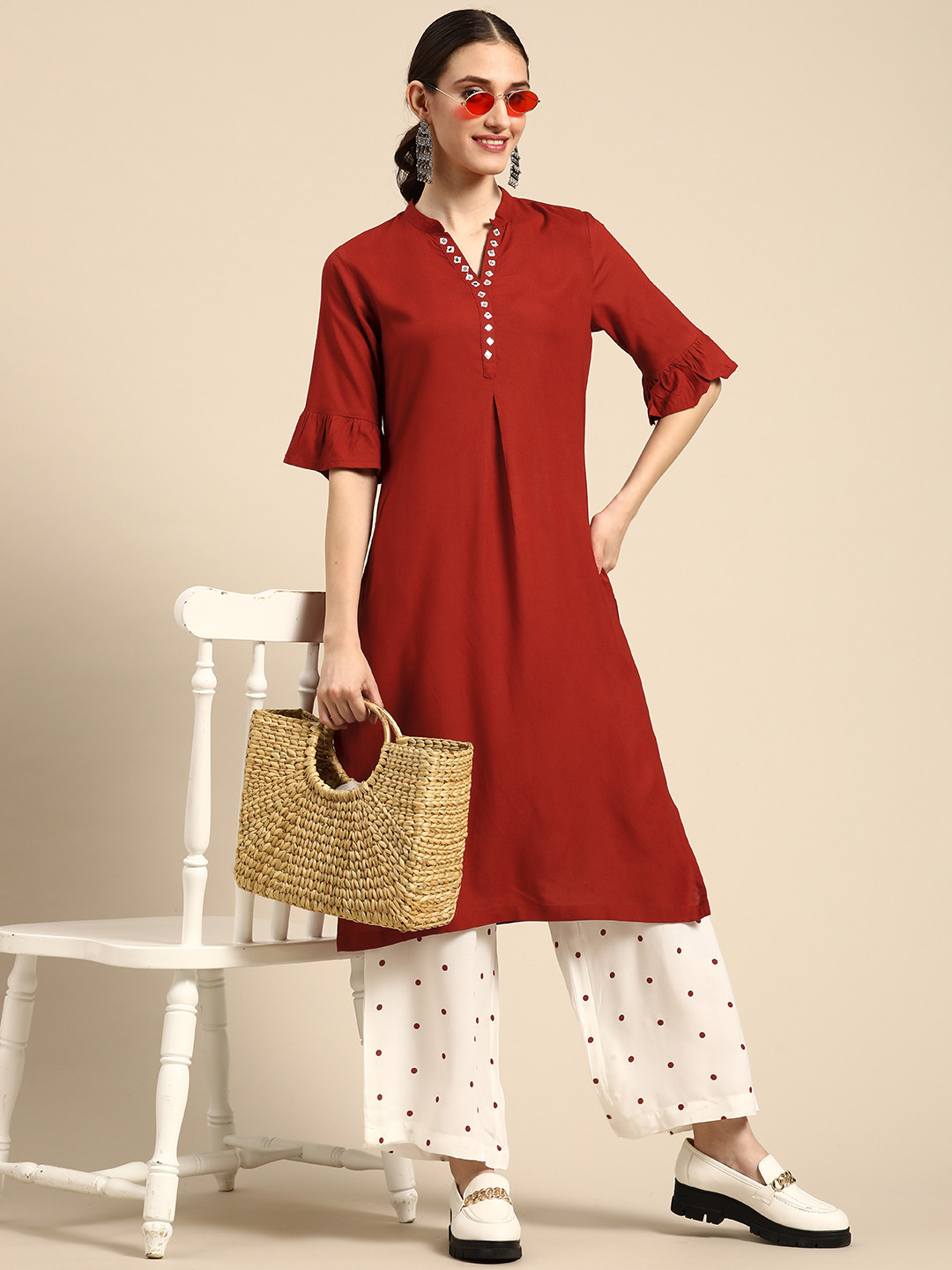 

Sangria Women Maroon & White Solid Kurta with Palazzos