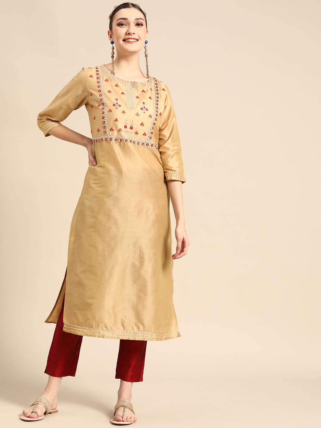 

Sangria Women Beige Ethnic Motifs Embroidered Yoke Design Kurta with Trousers