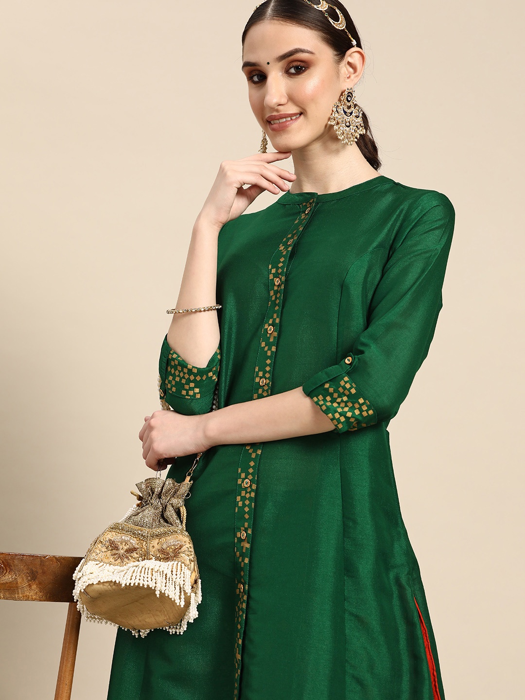 

Sangria Women Green & Golden Ethnic Motifs Printed Kurta with Palazzos