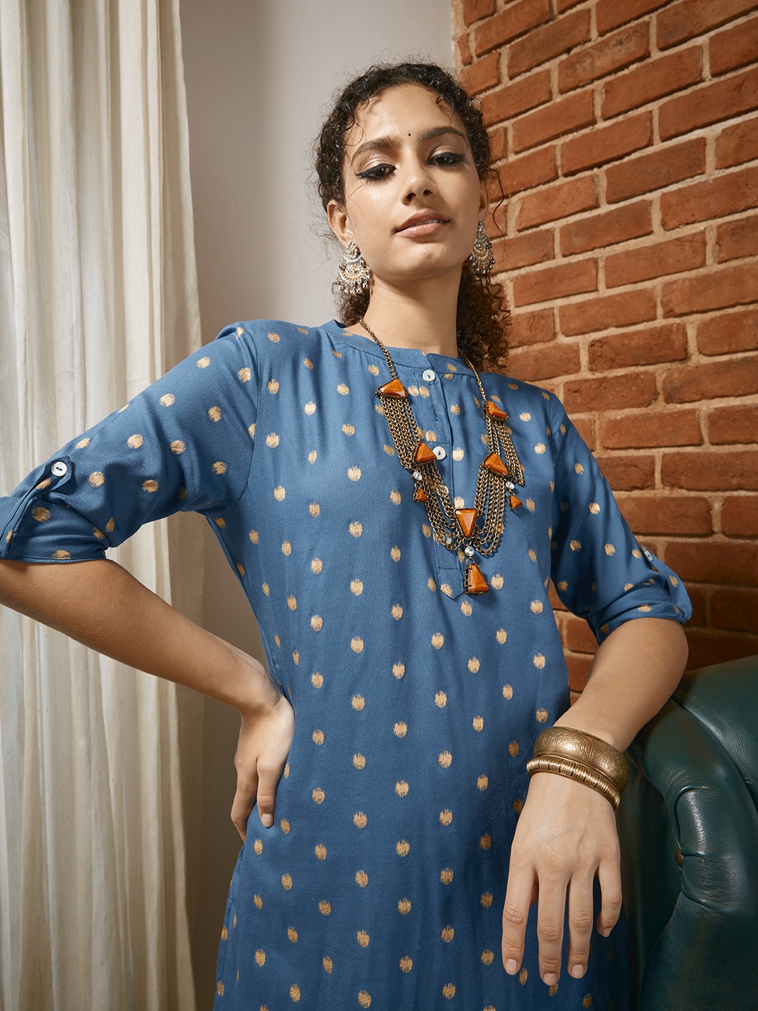 

Sangria Women Blue & Golden Printed Kurta