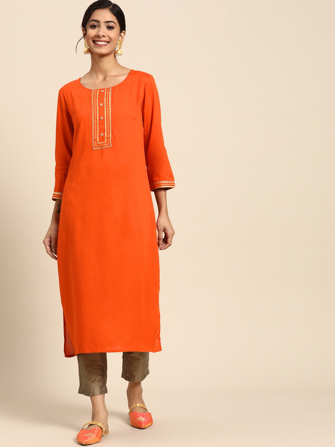 

Sangria Women Orange Ethnic Motifs Yoke Design Thread Work Kurta