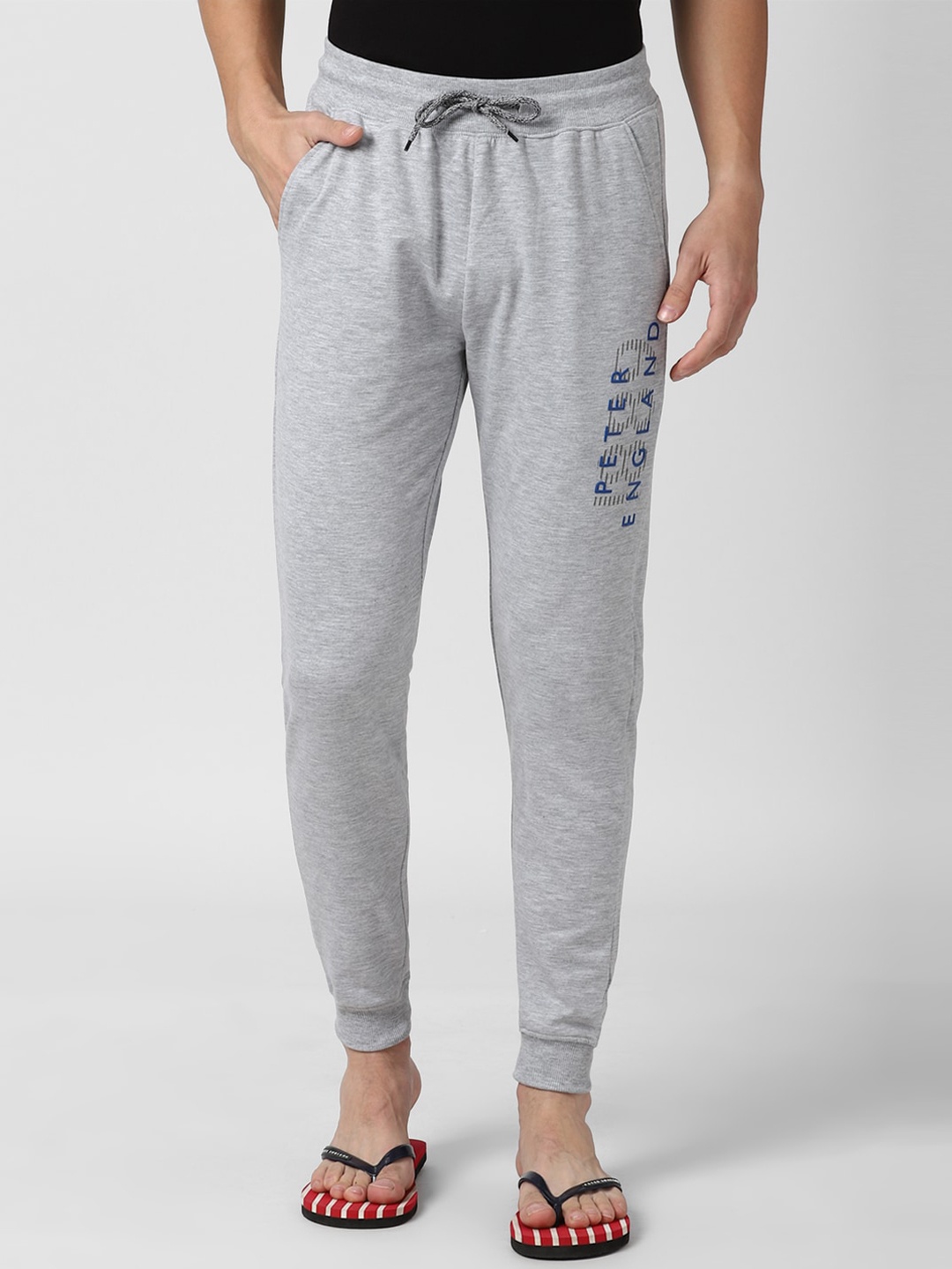

Peter England Men Grey Melange Brand Logo Printed Cotton Joggers