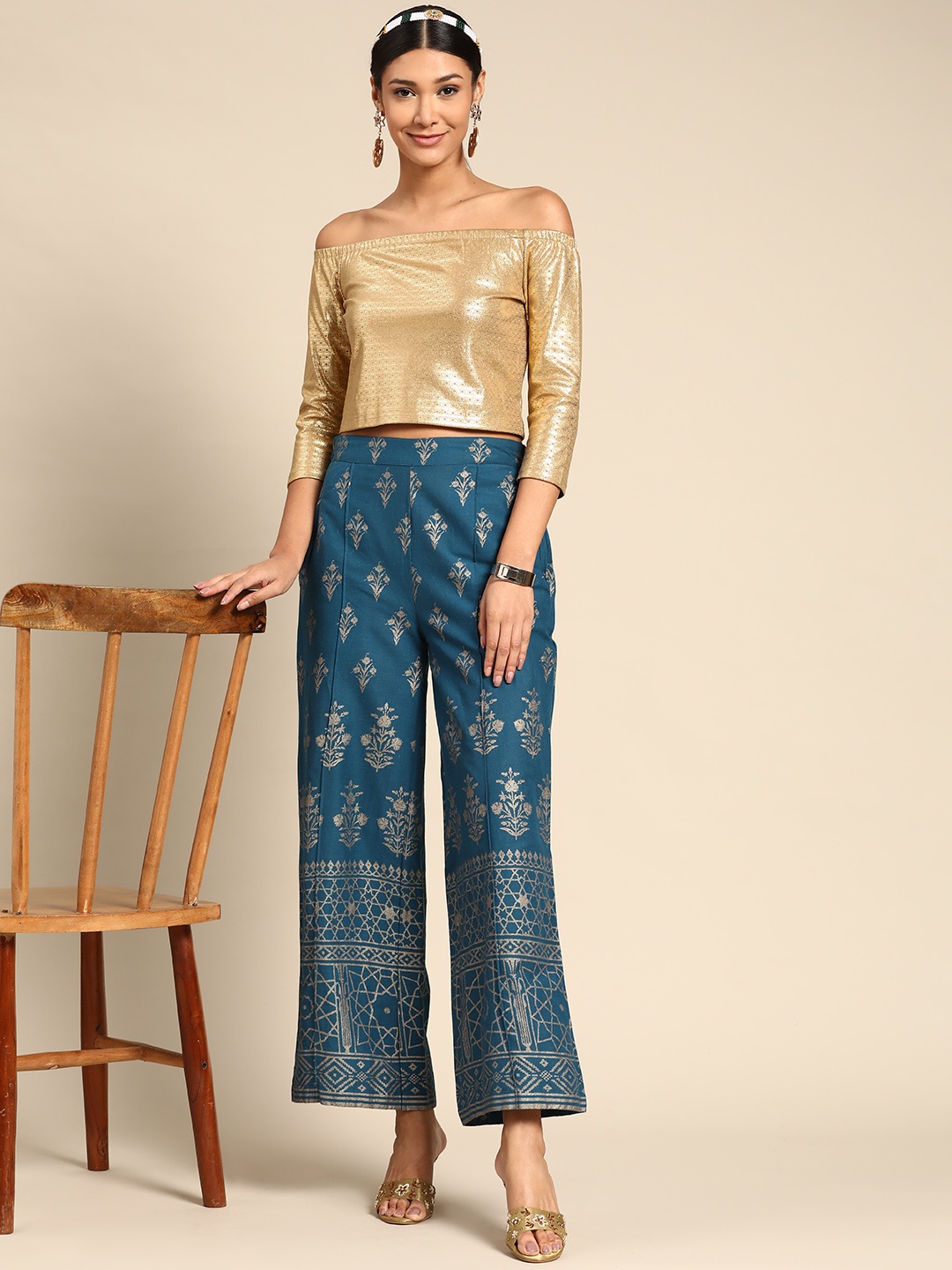 

Sangria Women Teal Blue & Gold-Toned Floral Printed Cotton Wide Leg Palazzos