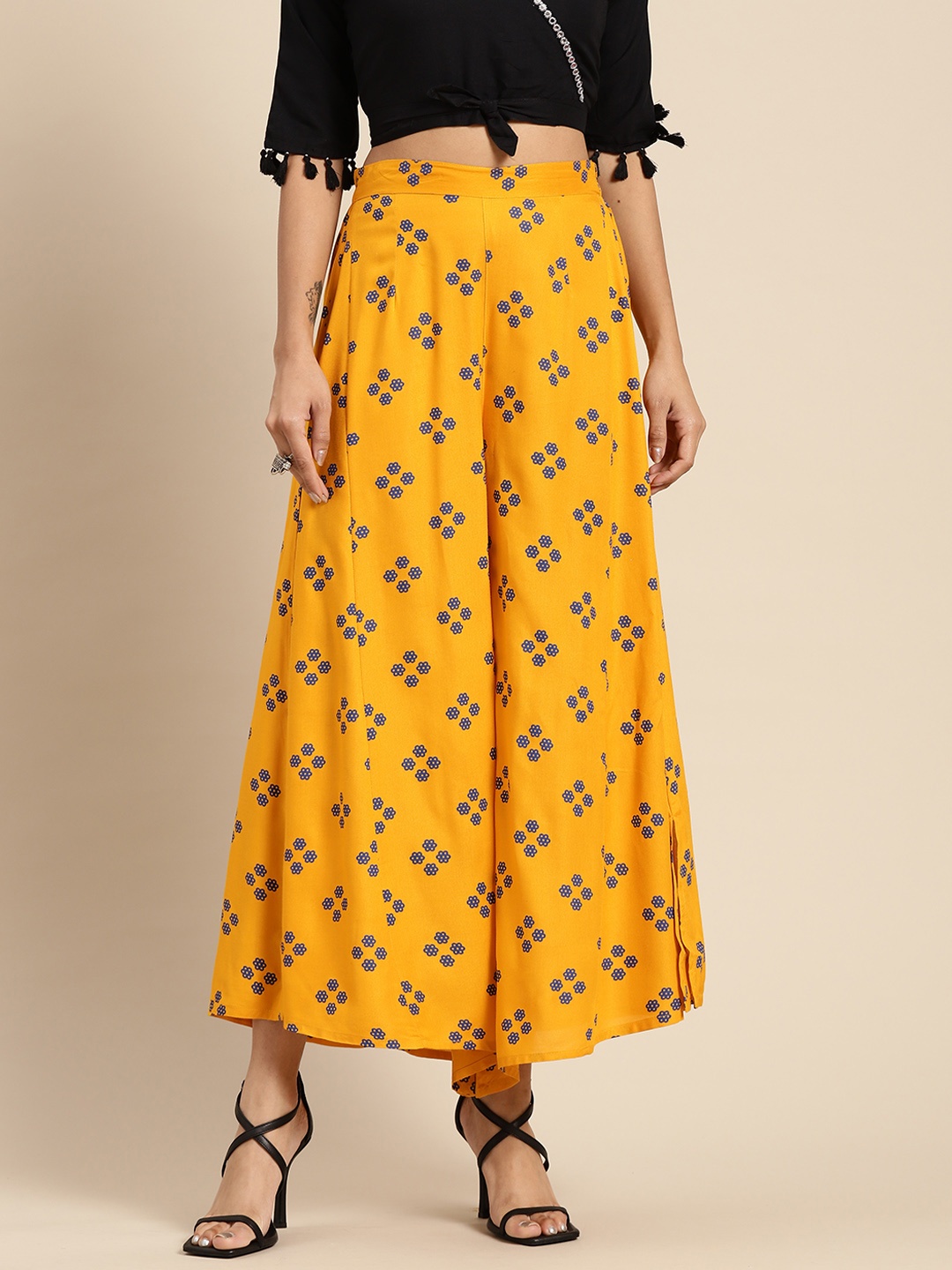 

Sangria Women Mustard Yellow & Blue Ethnic Motifs Printed Flared Palazzos