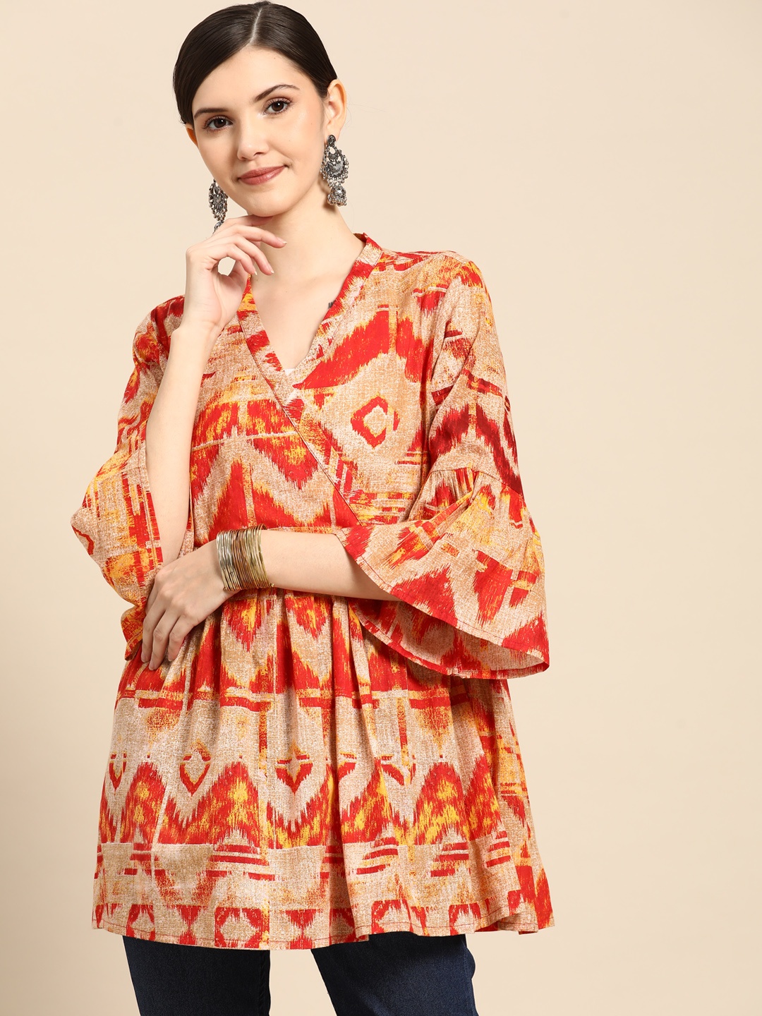 

Sangria Women Beige & Orange Abstract Printed Top