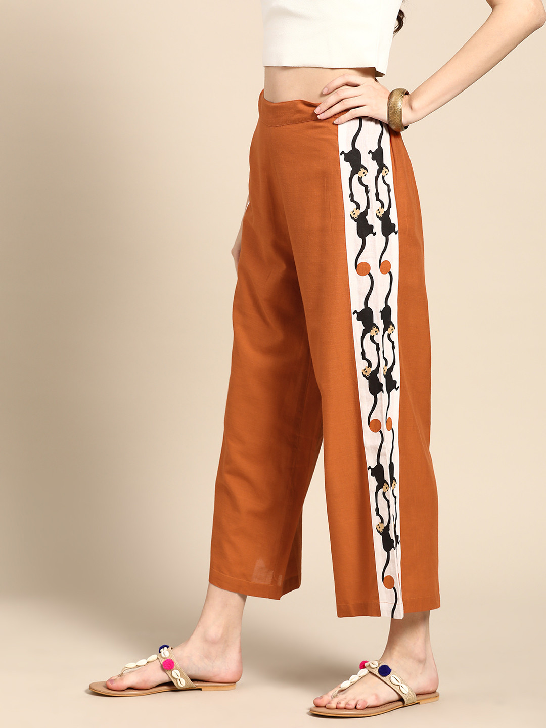 

Sangria Women Rust Orange Pure Cotton Cropped Parallel Trousers