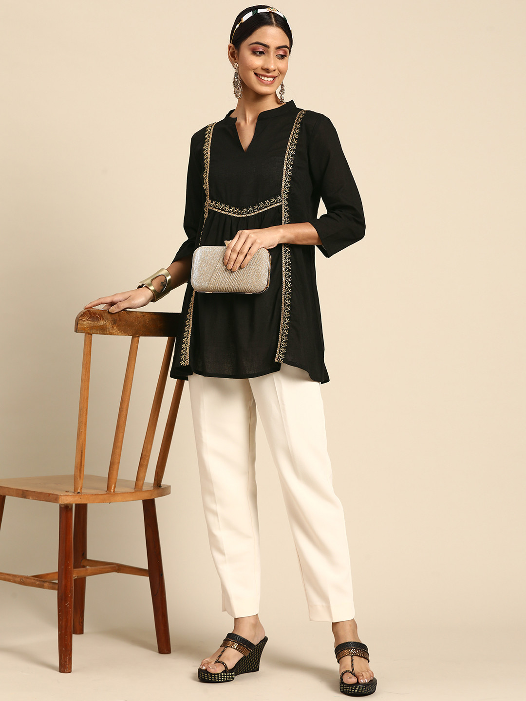 

Sangria Black & Golden Embroidered Pure Cotton Tunic