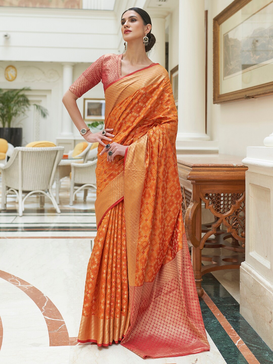 

Mitera Women Mustard & Gold-Toned Woven Design Zari Silk Blend Patola Saree