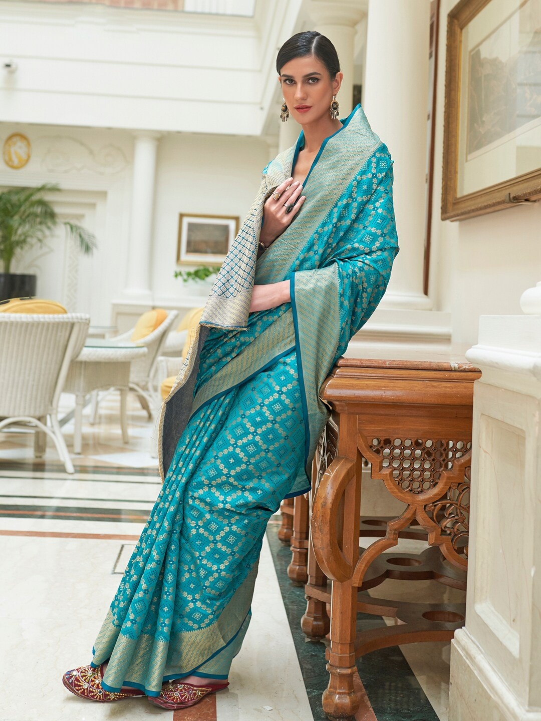

Mitera Blue & Gold-Toned Woven Design Zari Silk Blend Patola Saree