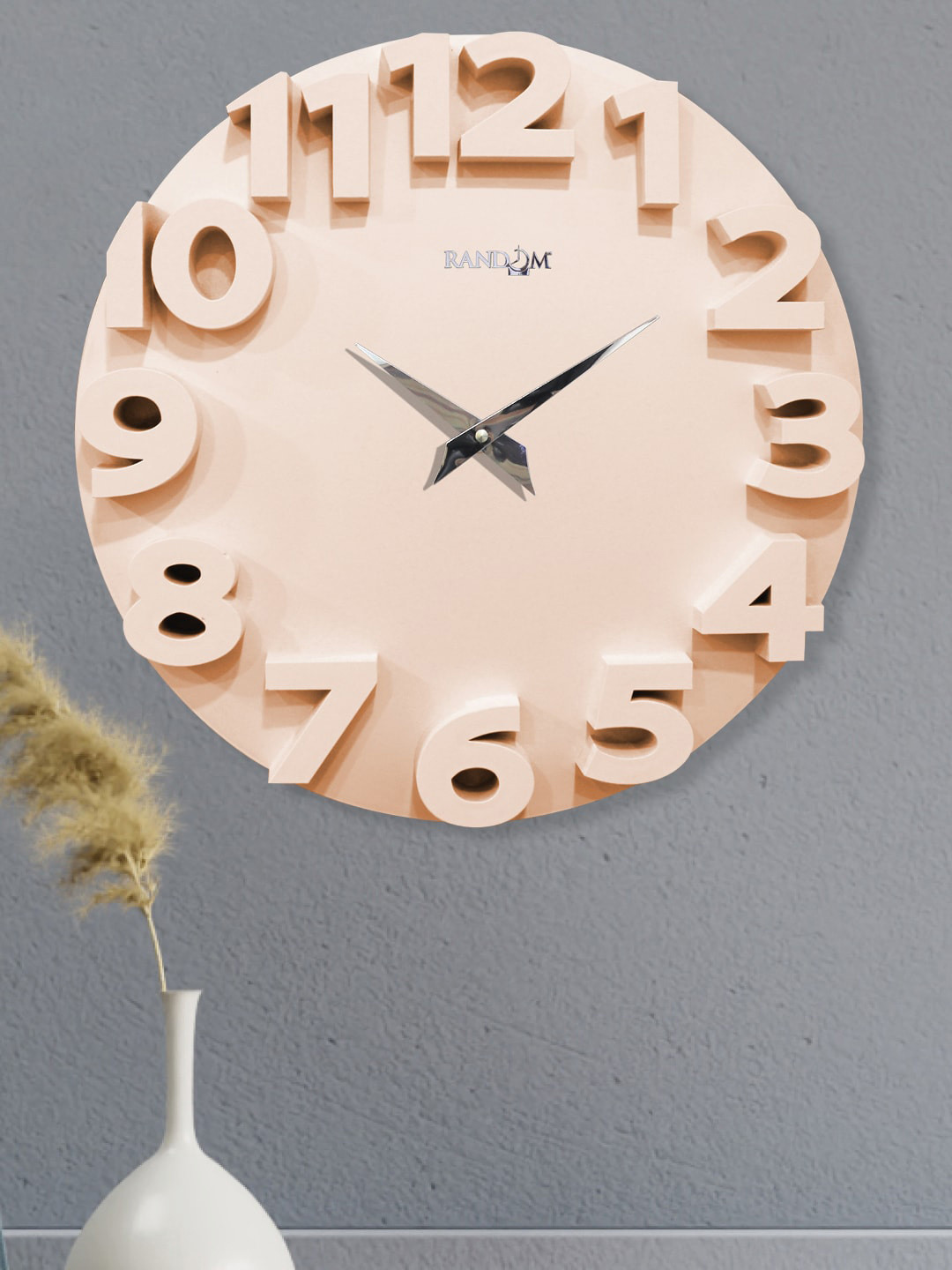 

RANDOM Unisex Peach Clocks
