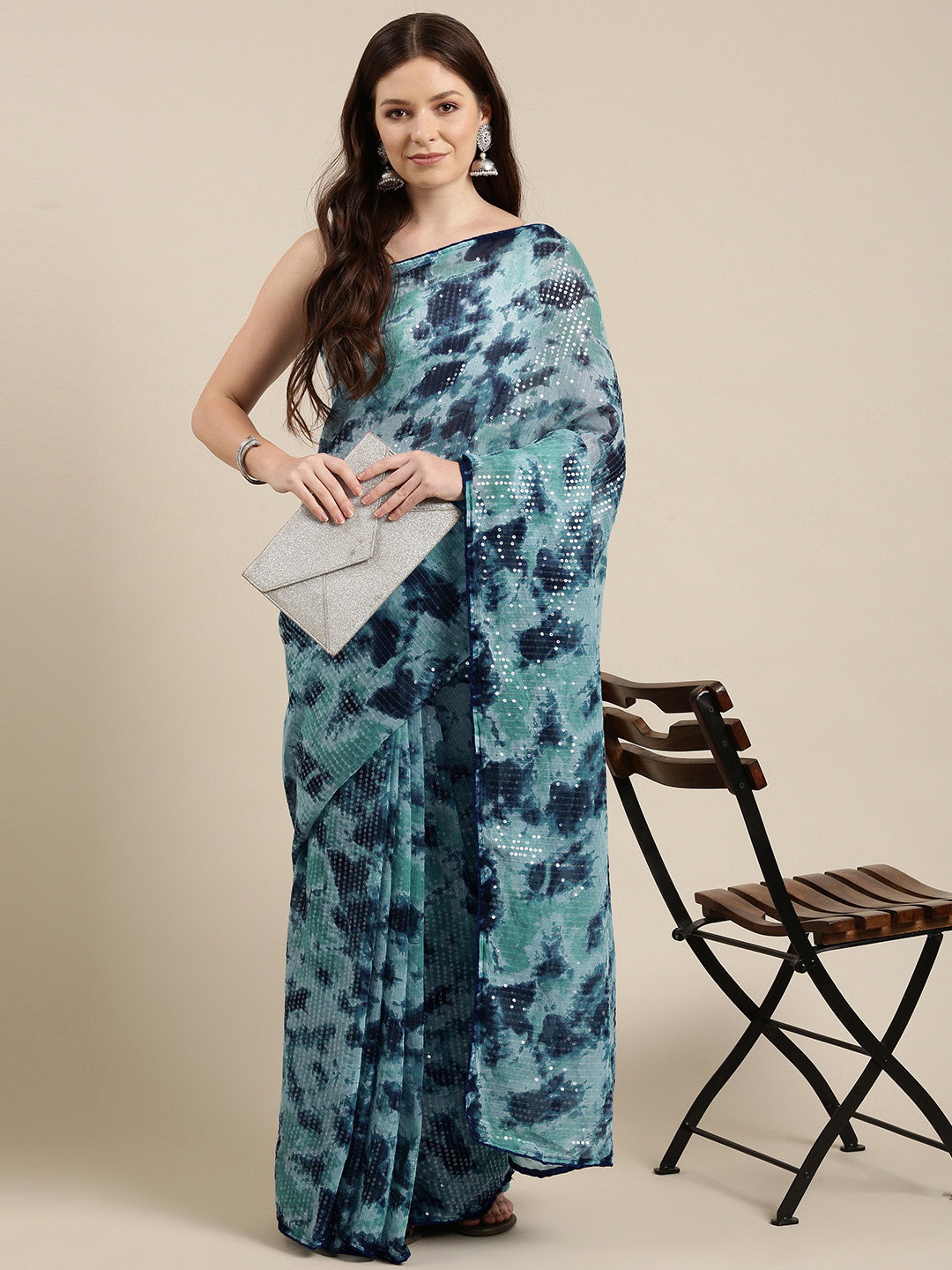 

Sugathari Turquoise Blue & Navy Blue Sequinned Saree