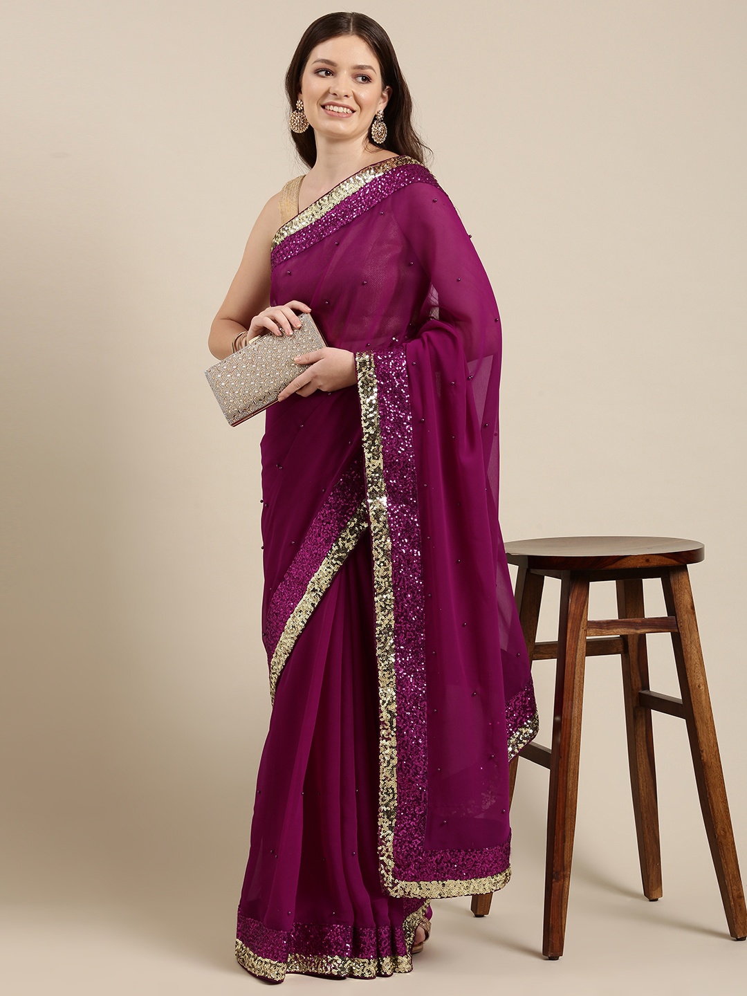 

Sugathari Magenta Embellished Sequinned Saree