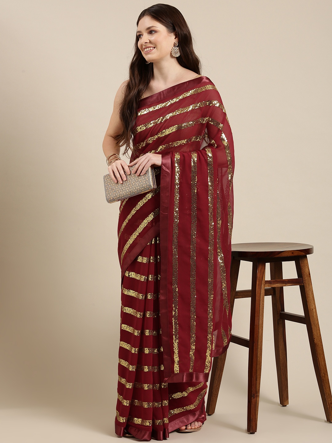 

Sugathari Maroon Embellished Sequinned Saree