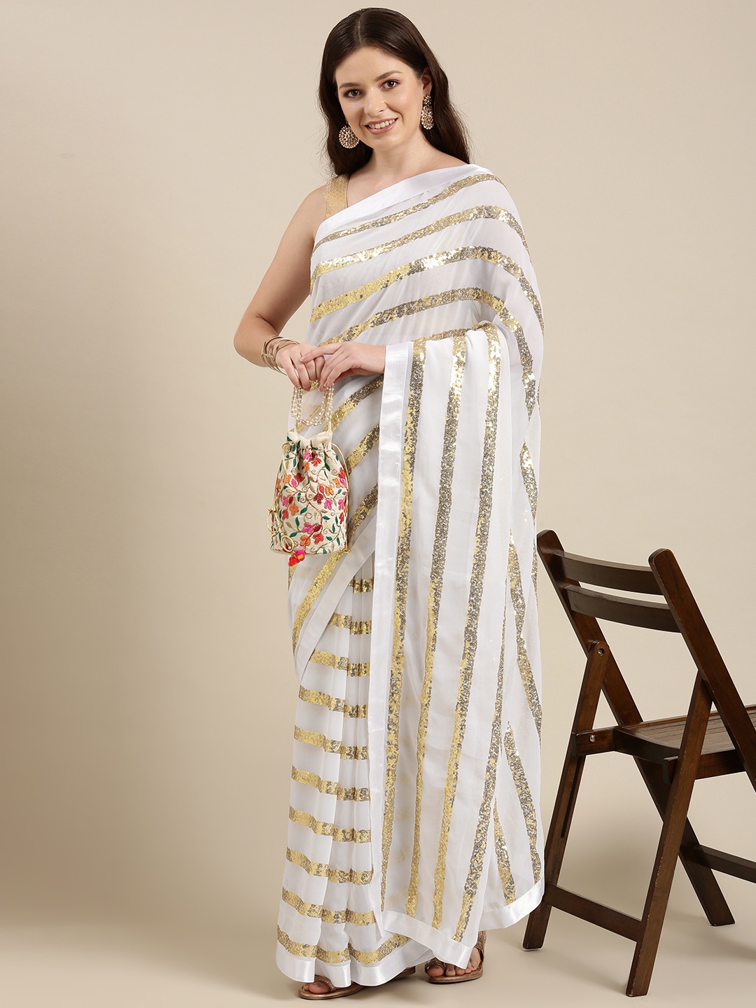 

Sugathari White & Gold-Toned Embellished Sequinned Saree