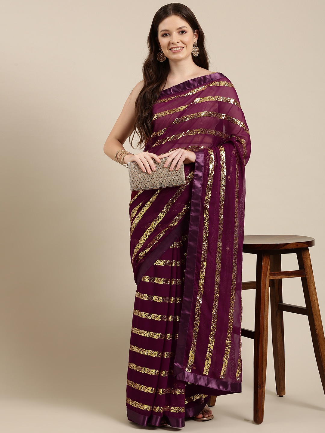 

Sugathari Magenta Embellished Sequinned Saree