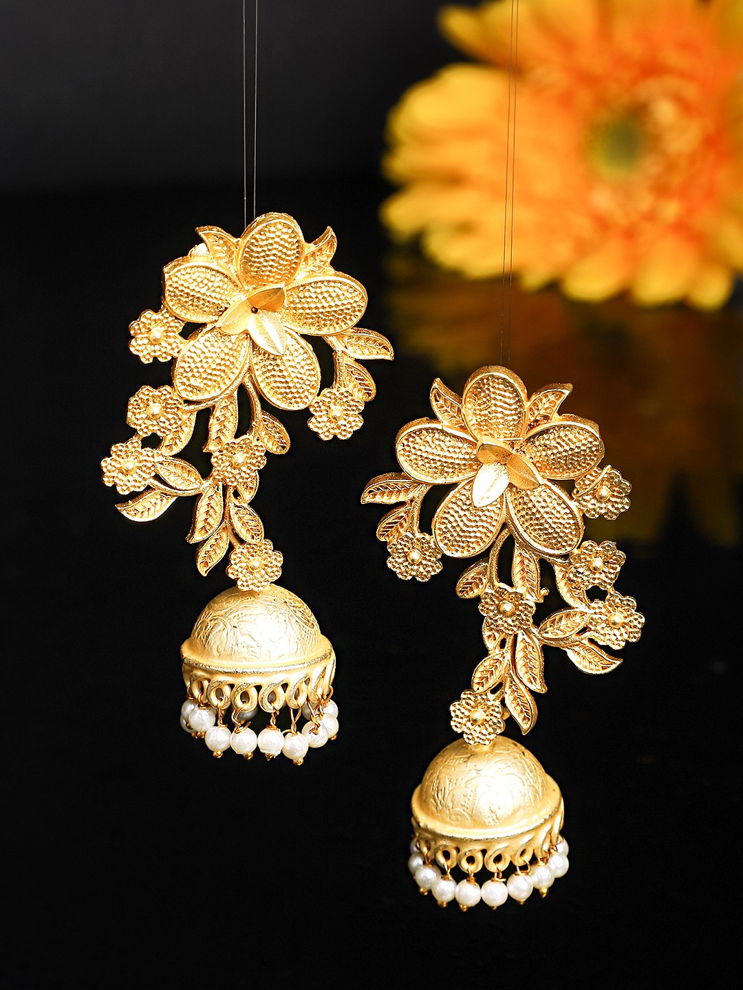 

Yellow Chimes Woman Gold Plated Floral Designed Long Jhumka Earrings