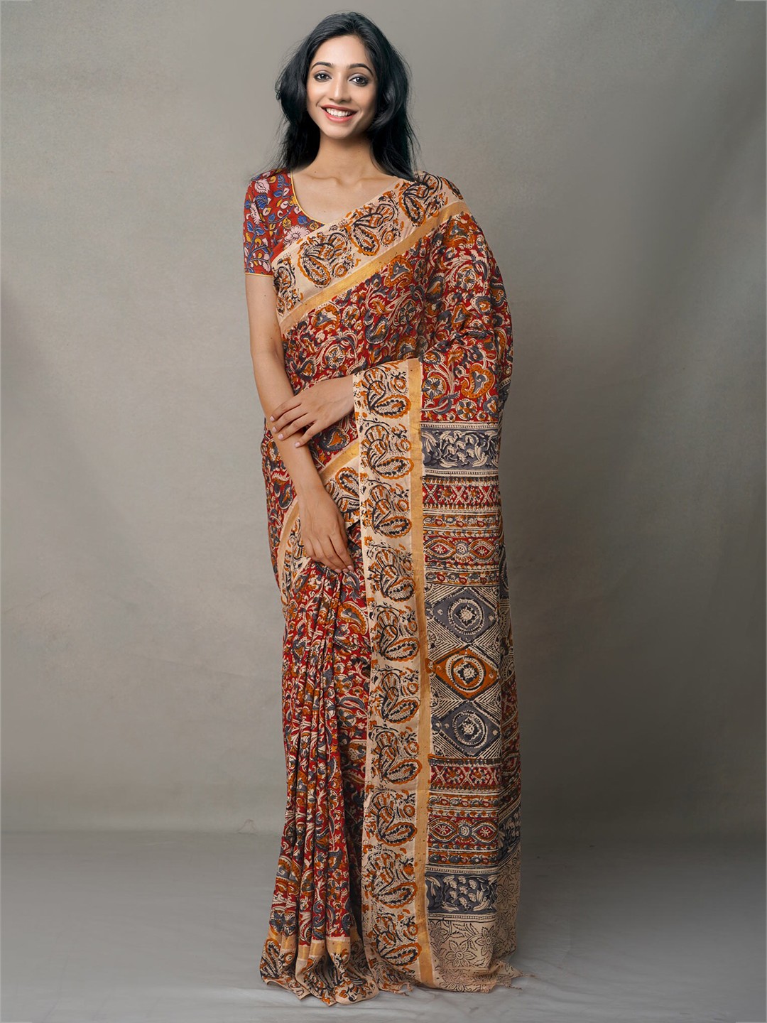 

Unnati Silks Red & Orange Kalamkari Pure Silk Block Print Saree