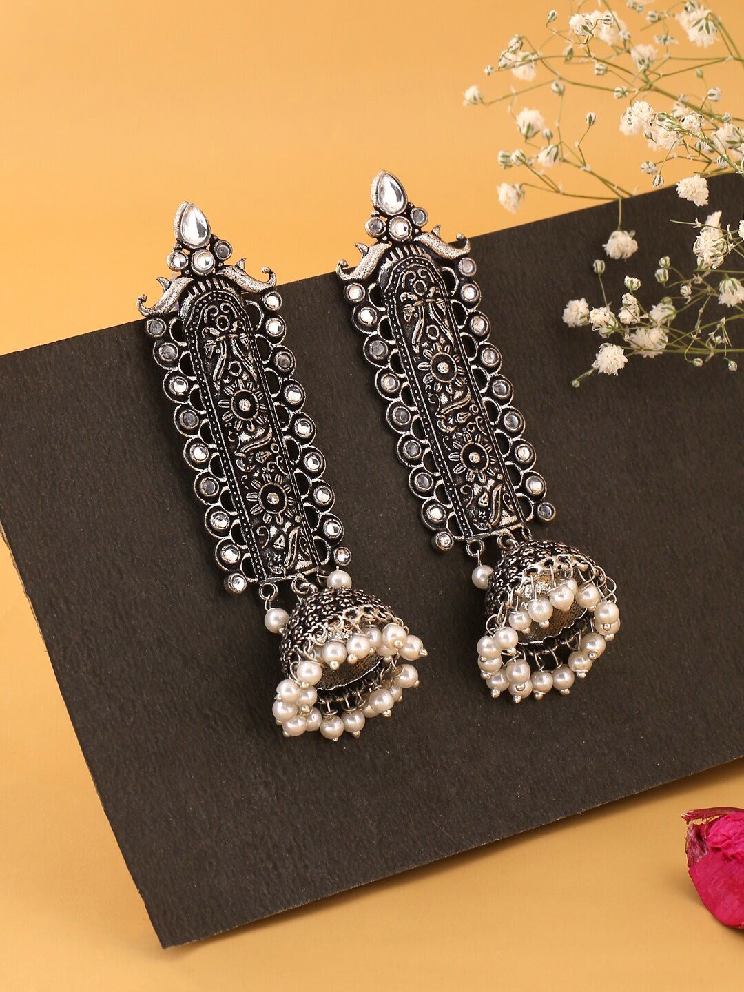 

kashwini Women Silver-Toned Contemporary Jhumkas Earrings