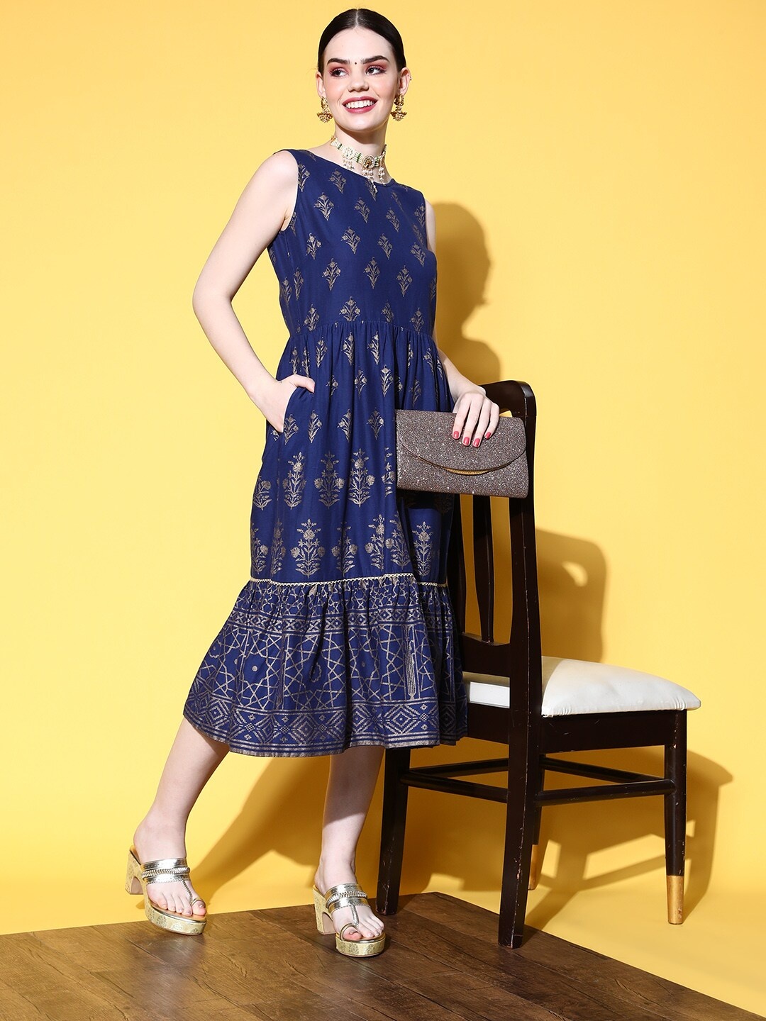 

Sangria Women Pure Cotton Ethnic Motifs Printed Zari Embroidered Cut-out Dress, Navy blue