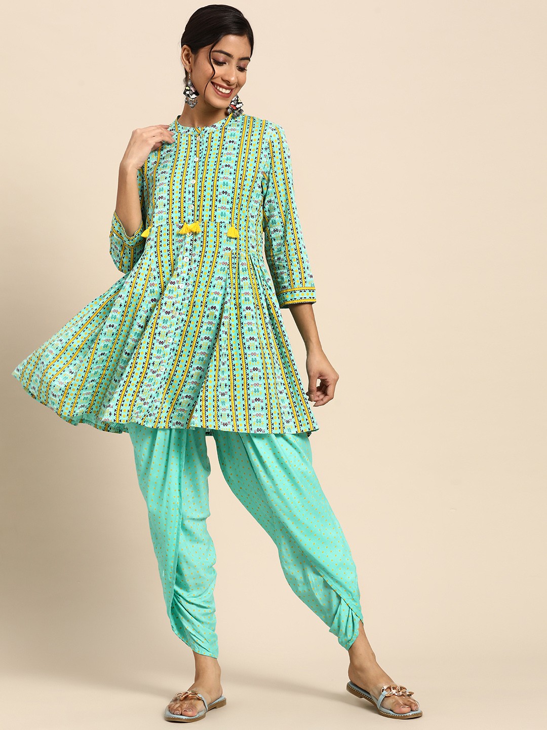 

Sangria Women Blue & Yellow Ethnic Motifs Printed Kurti with Dhoti Pants