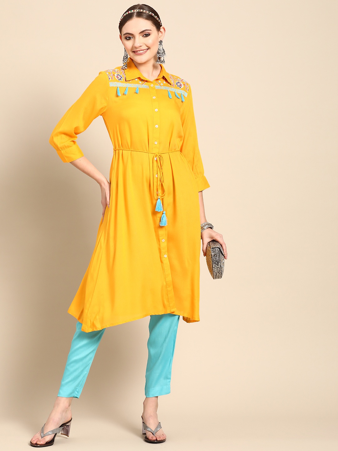 

Sangria Women Yellow Ethnic Motifs Embroidered Thread Work Kurta with Trousers