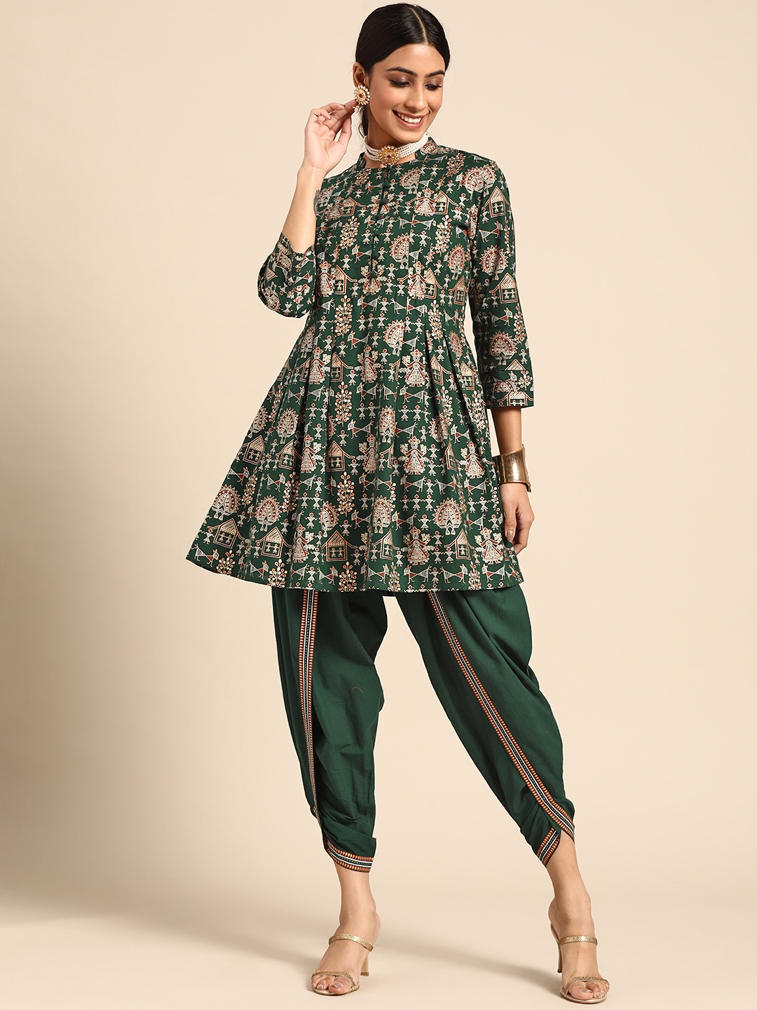 

Sangria Women Green & Golden Tribal Printed Pure Cotton Kurta with Dhoti Pants
