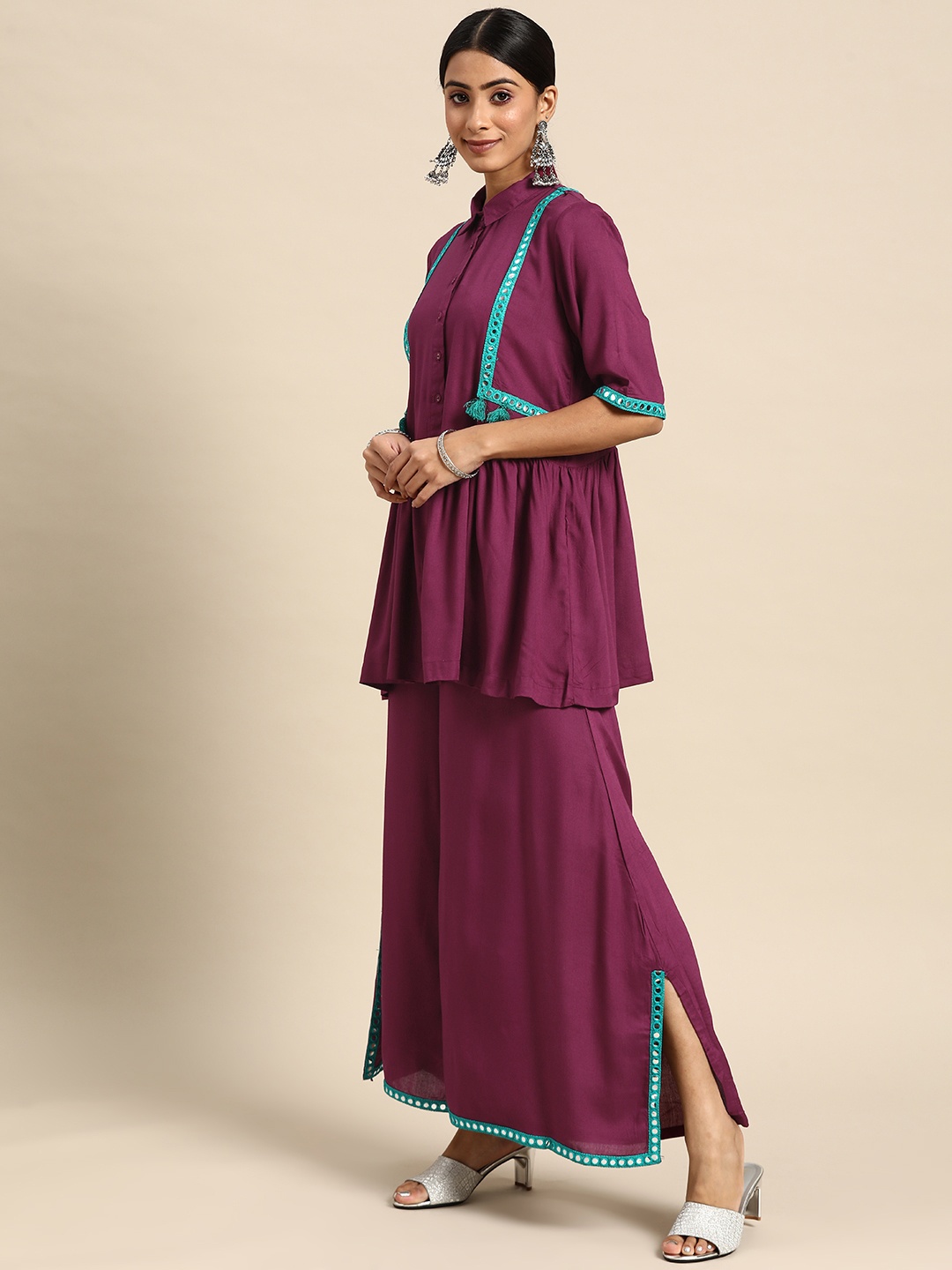

Sangria Women Burgundy Solid Mirror Work Kurti with Palazzos