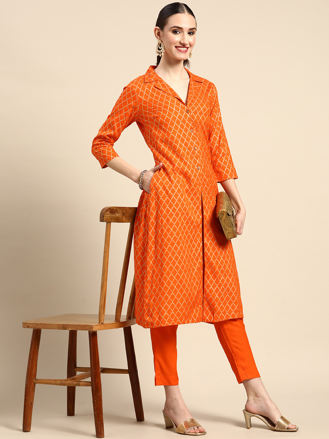 

Sangria Women Orange Printed Kurta with Trousers