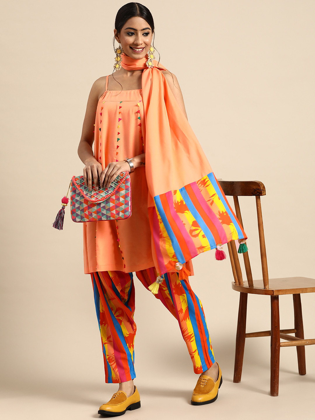 

Sangria Women Peach-Coloured Panelled Kurta with Trousers & With Dupatta