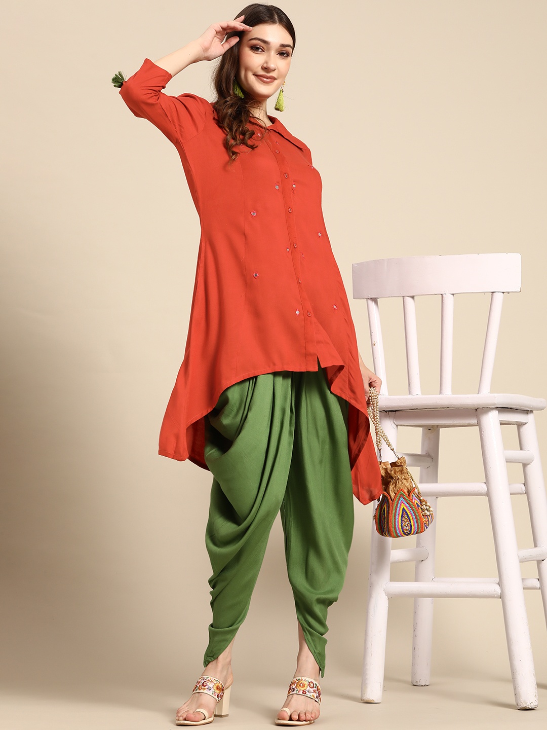 

Sangria Women Rust Red Ethnic Motifs Embroidered Mirror Work Kurta with Dhoti Pants