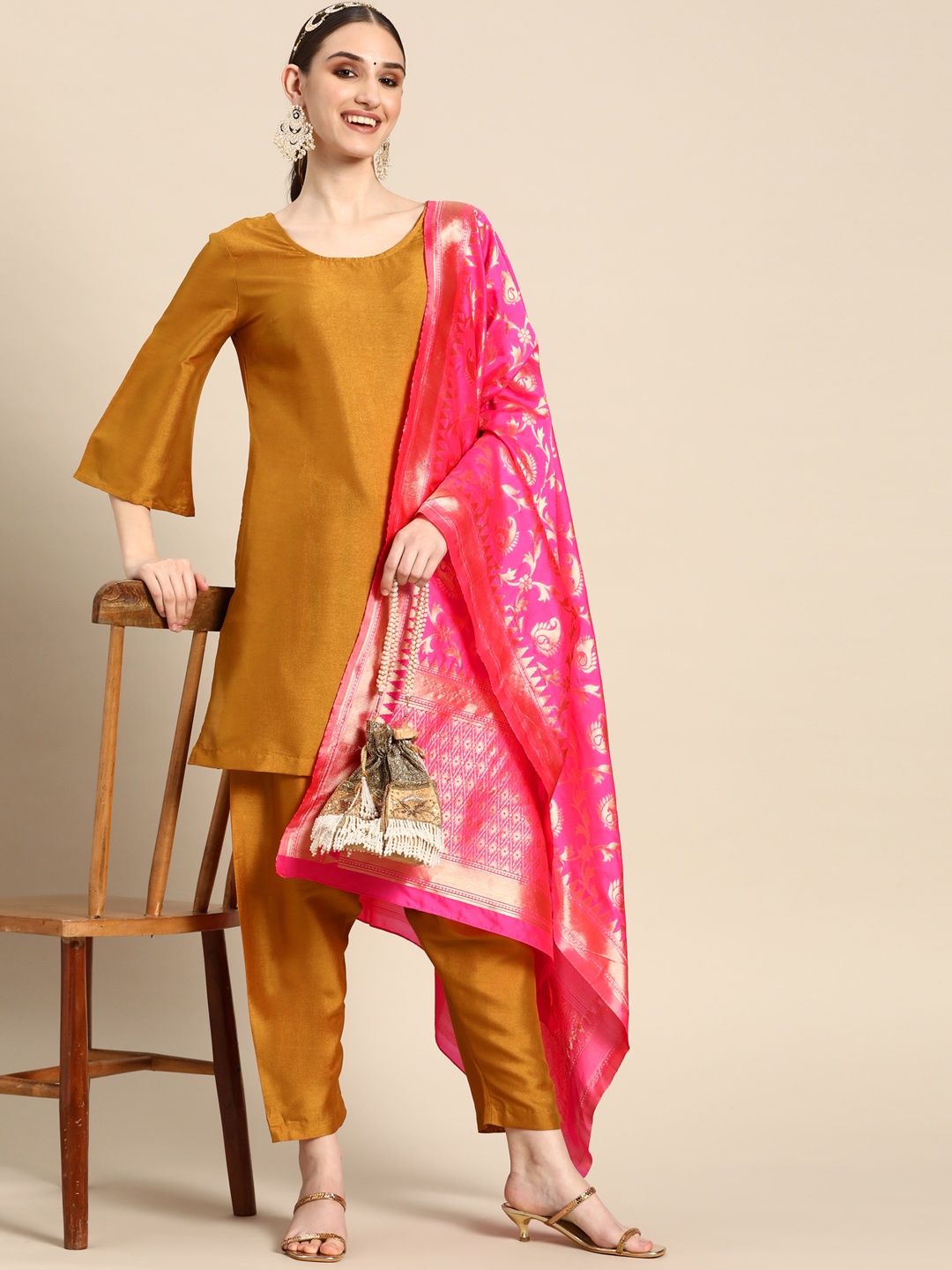 

Sangria Women Solid Flared Sleeve Kurta with Salwar & With Dupatta, Mustard