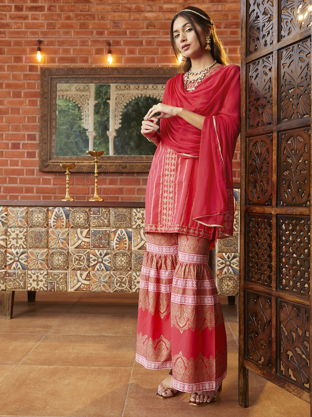 

Sangria Women Coral Pink & Golden Printed Pure Cotton Kurta with Sharara & With Dupatta