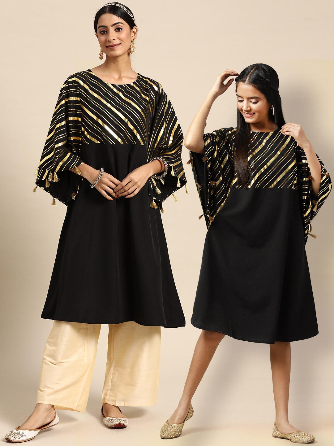

Sangria Women Black & Golden Striped Kaftan Kurta
