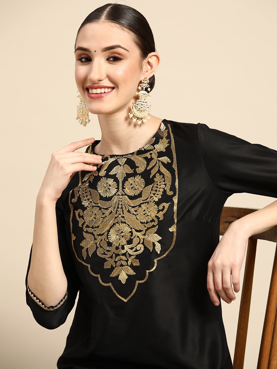 

Sangria Women Black & Gold-Toned Ethnic Motifs Yoke Design Thread Work Kurta
