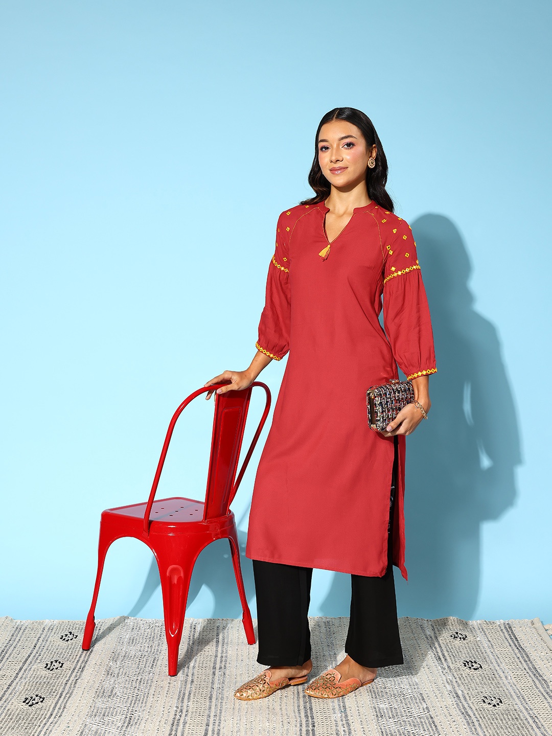 

Sangria Tassel Detailed Mirror Work Puff Sleeves Kurta, Rust