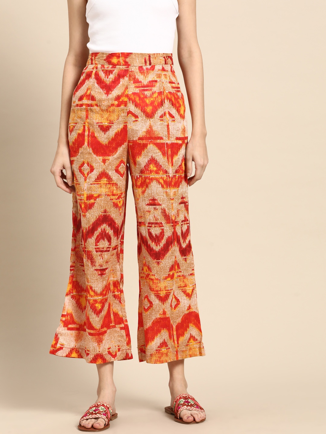 

Sangria Women Beige & Orange Printed Flared Cropped Ethnic Palazzos