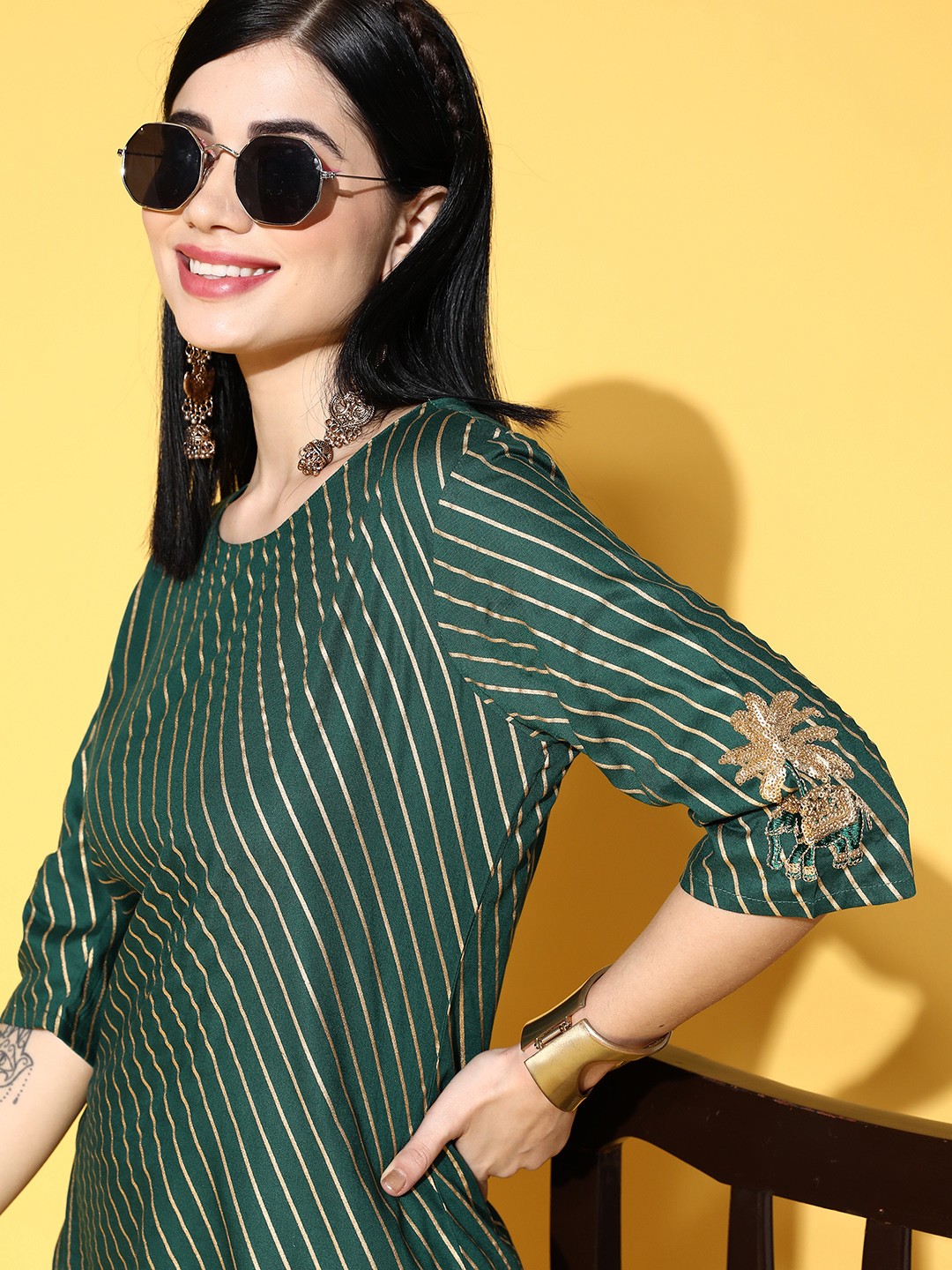 

Sangria Women Green & Golden Striped Tunic