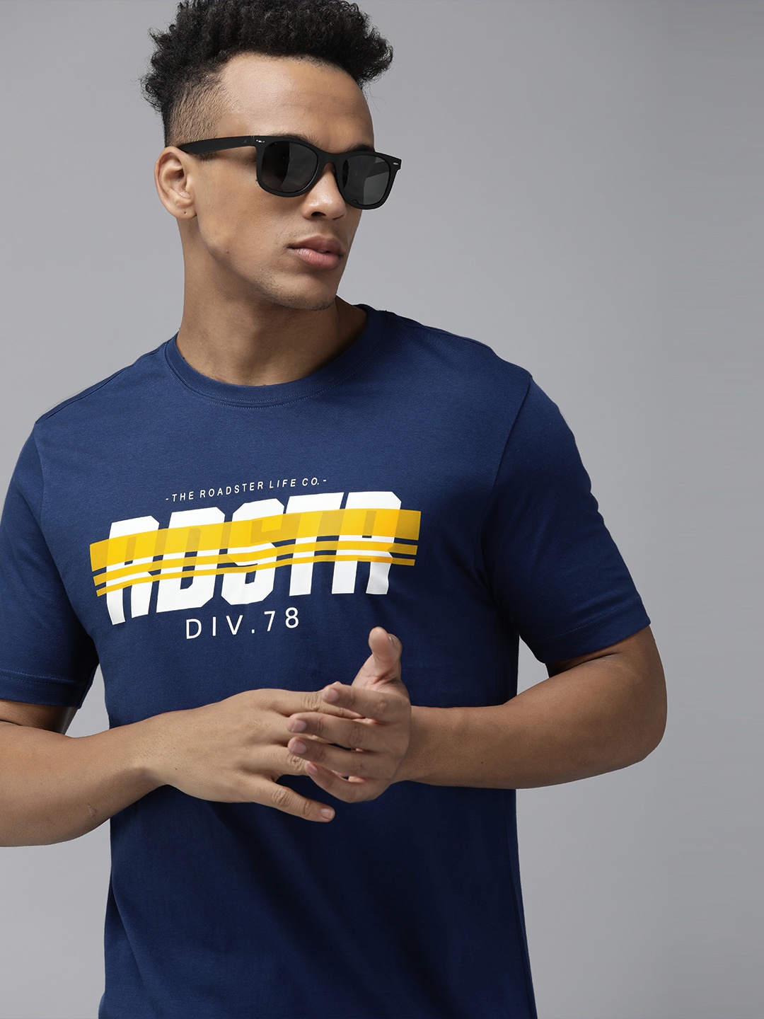 

Roadster Men Navy Blue & Yellow Brand Logo Printed Pure Cotton T-shirt