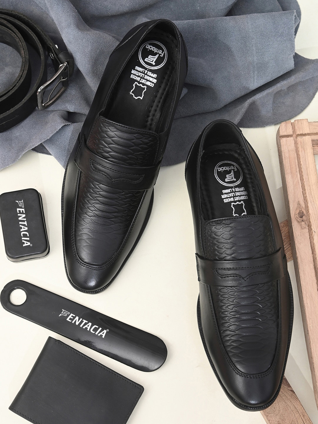 

Fentacia Men Black Solid Leather Formal Slip-On
