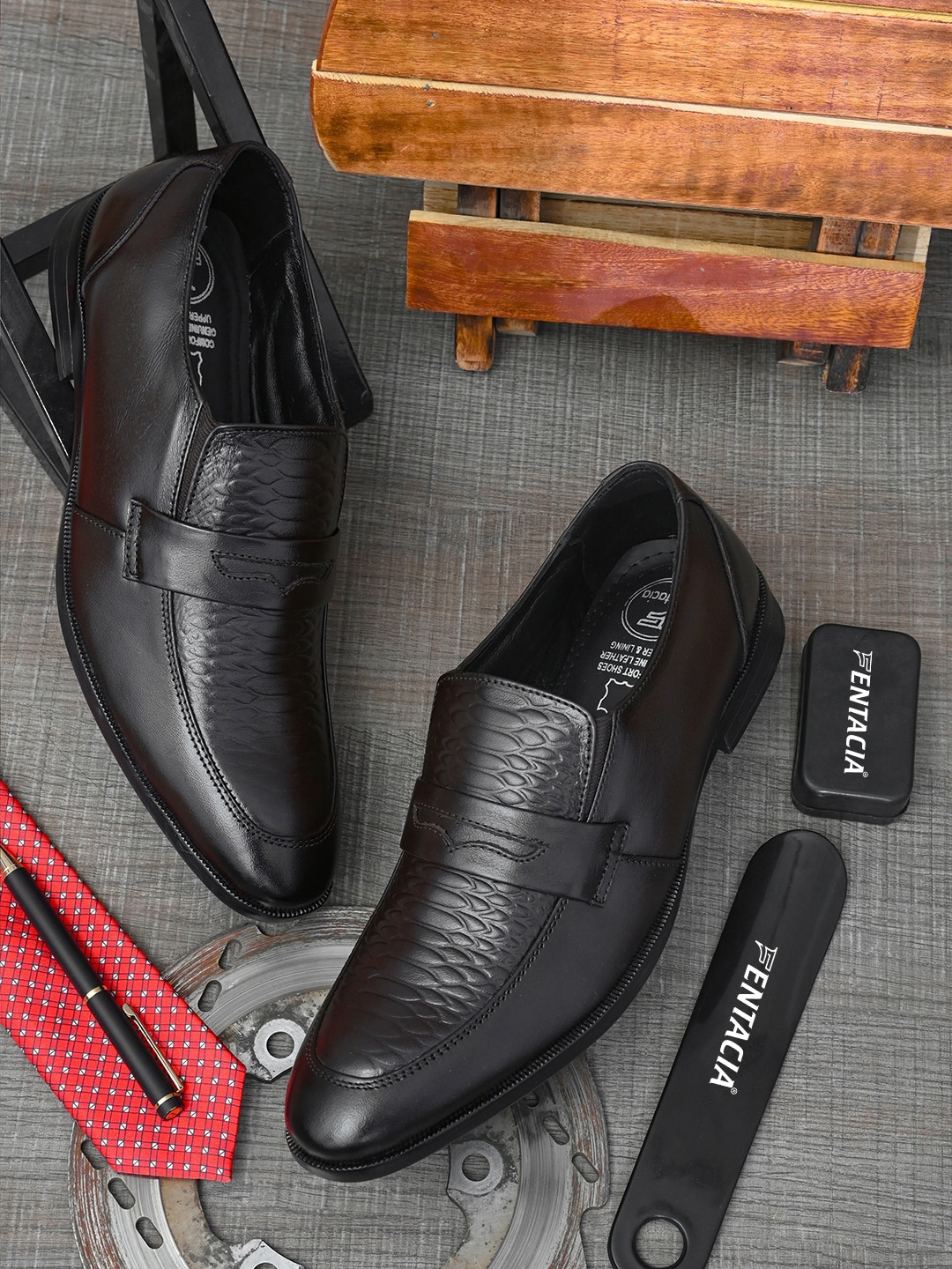 

Fentacia Men Brown Textured Leather Formal Slip-On