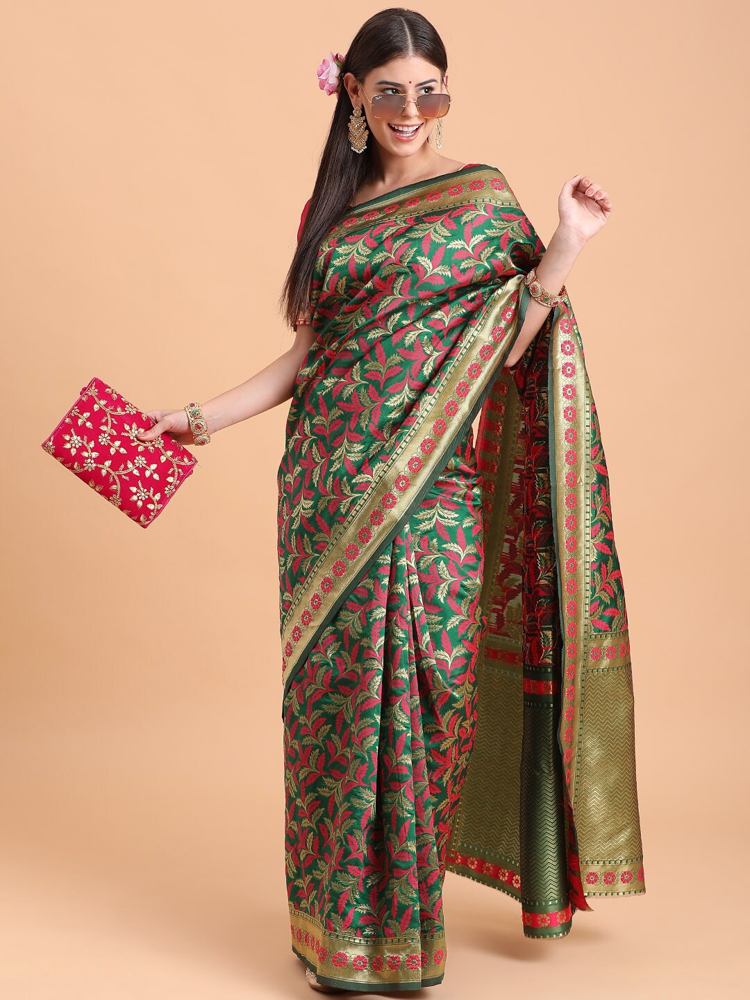 

Sangria Women Green Sarees