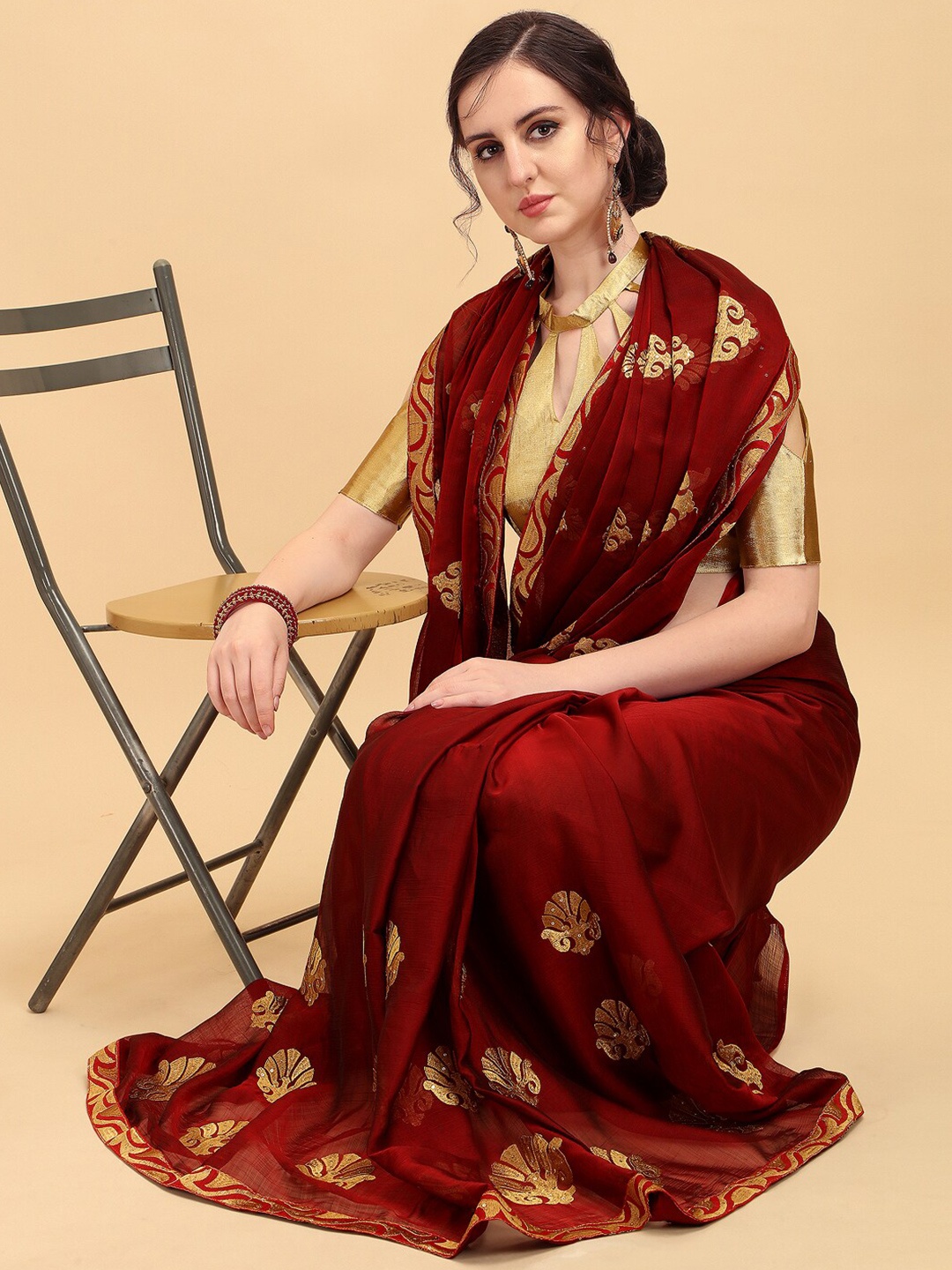 

Sangria Women Burgundy Sarees