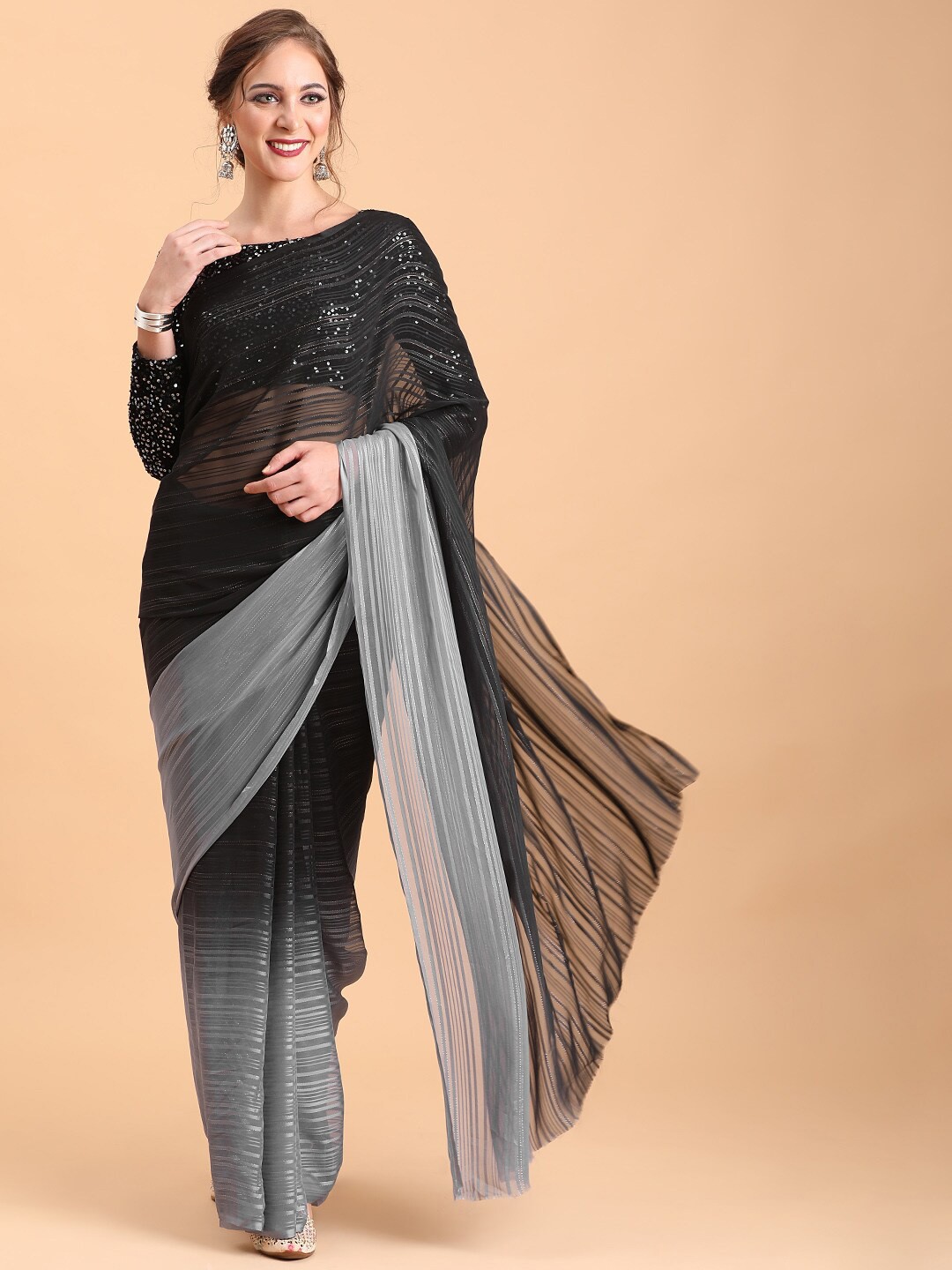 

Sangria Women Black Striped Sequinned Party Sarees