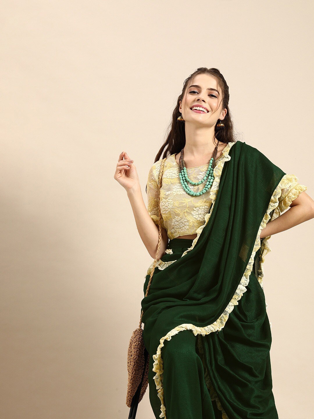 

Sangria Women Olive Sarees