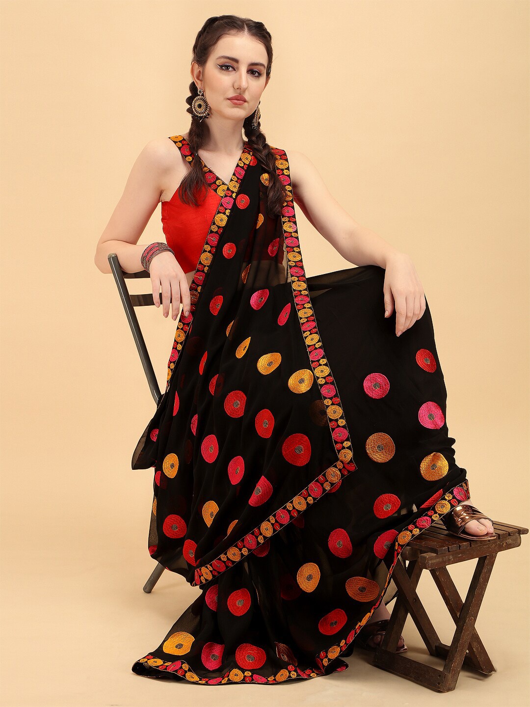 

Sangria Women Black Sarees