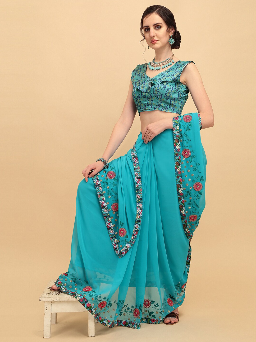 

Sangria Women Turquoise Blue Sarees