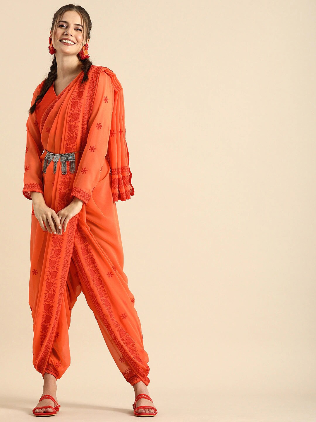 

Sangria Women Orange Sarees