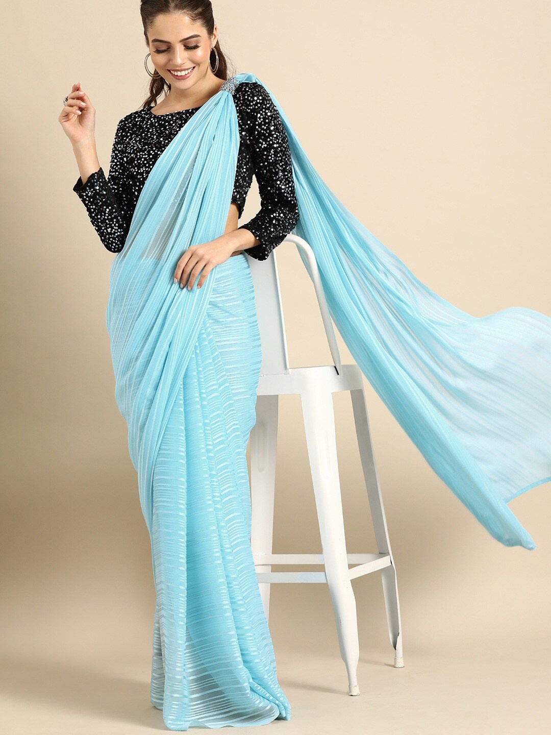 

Sangria Women Blue Sarees