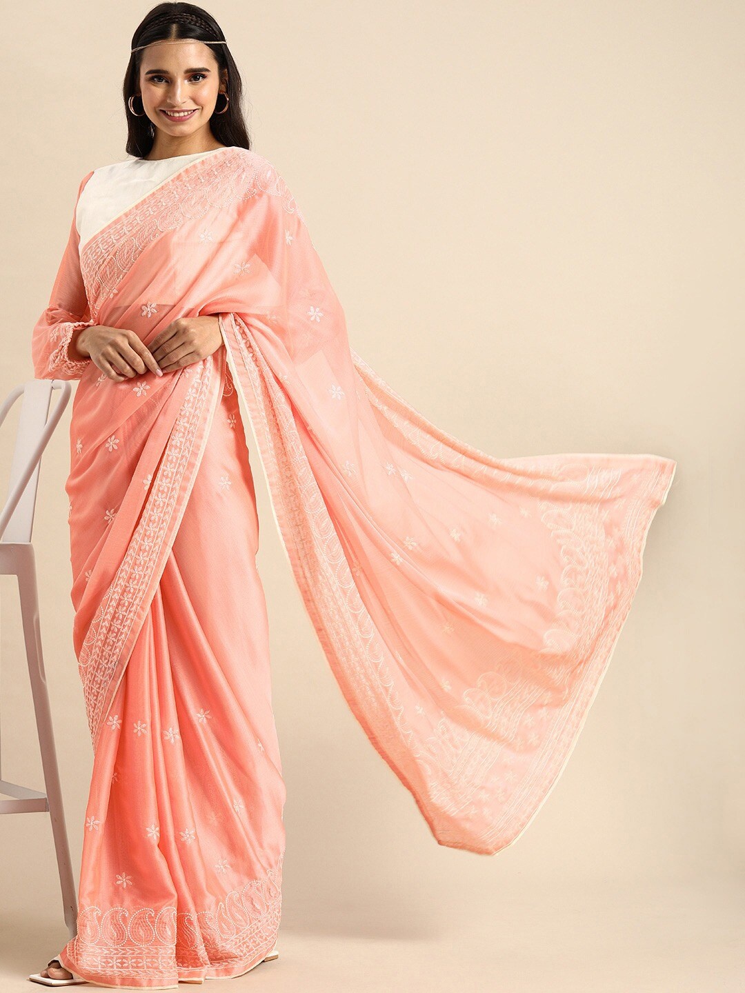 

Sangria Women Peach Sarees