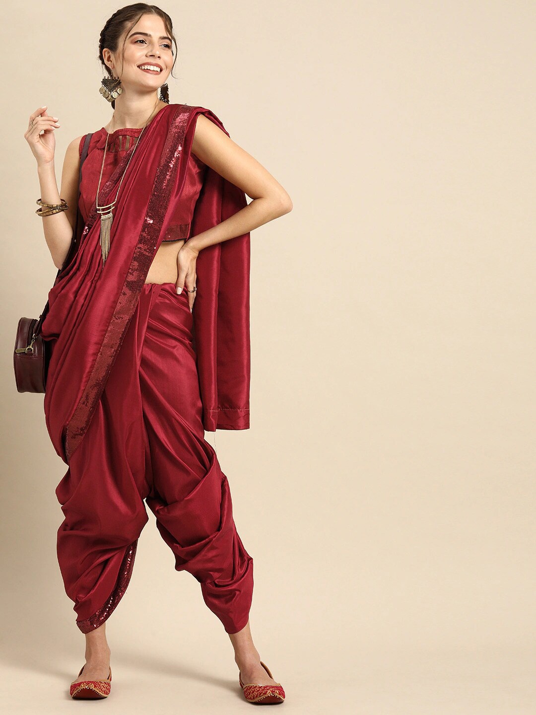 

Sangria Maroon Sequinned Border Silk Blend Saree